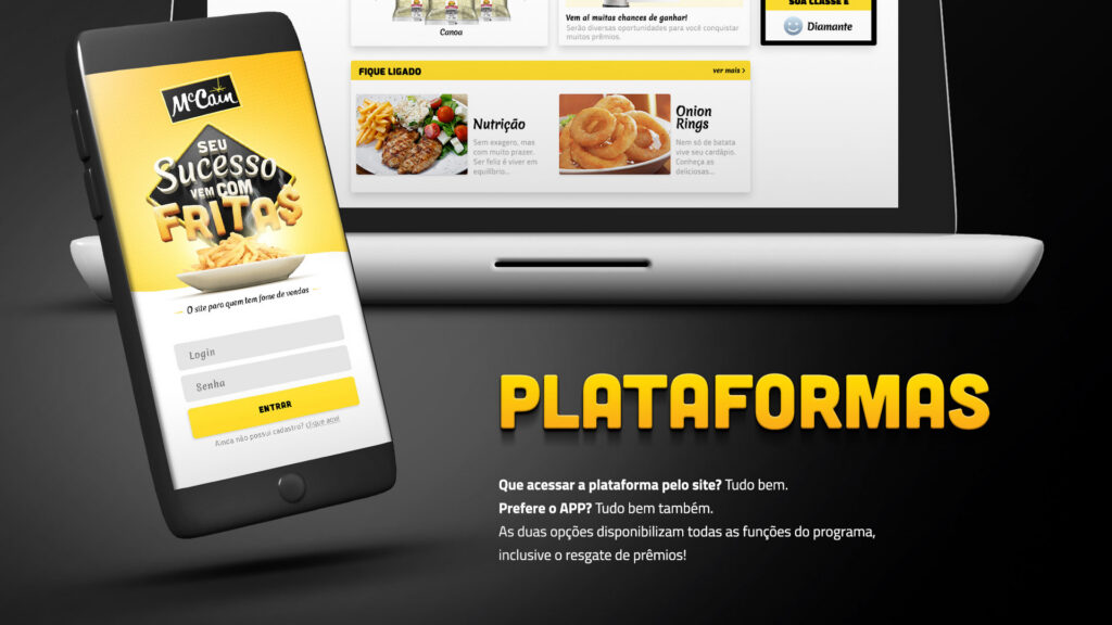 Smartphone com a tela de login do app McCain Seu Sucesso Vem com Fritas posicionado à frente de notebook com imagens do produto